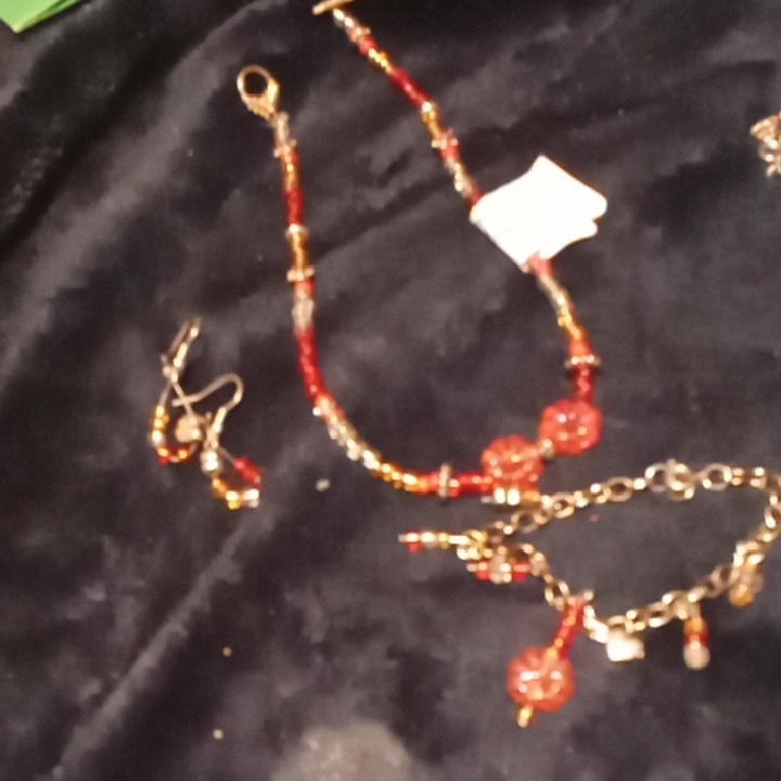 Artisanal Red And Gold Beaded Necklace With Multi-Strand Design